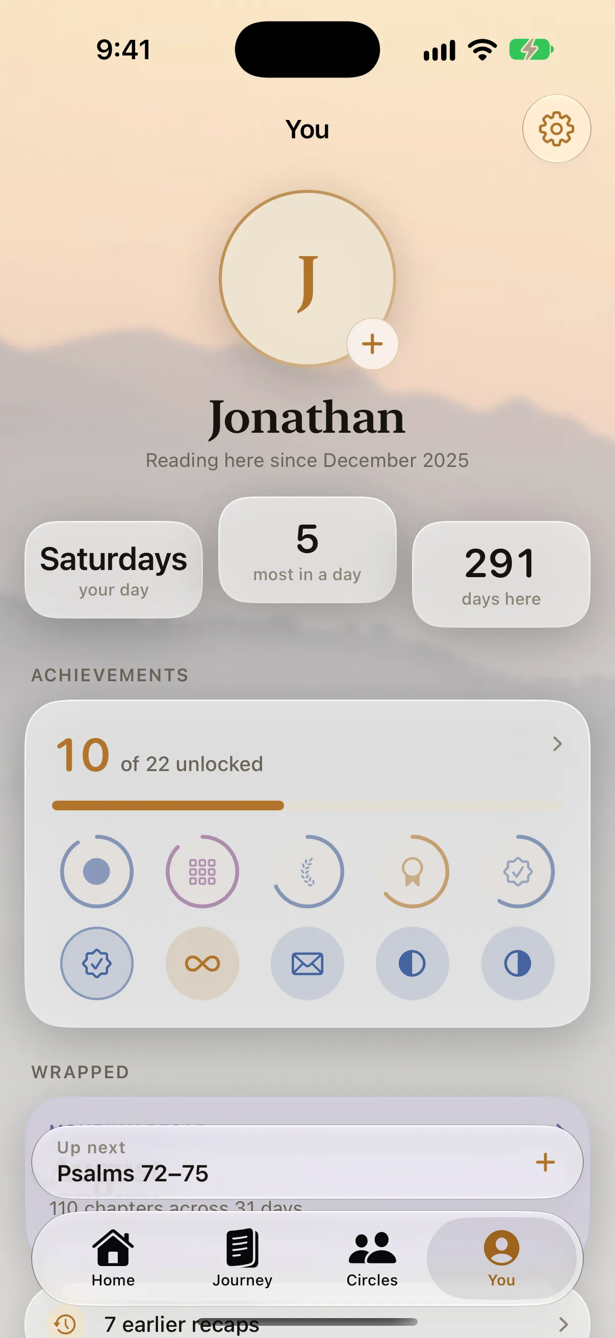 The You tab: an initial in a brass ring, the name Jonathan, reading here since December 2025, and the achievements case.